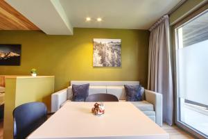 Posteľ alebo postele v izbe v ubytovaní Sui Generis - Aosta Urban Apartments