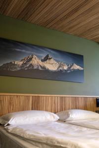 Posteľ alebo postele v izbe v ubytovaní Sui Generis - Aosta Urban Apartments