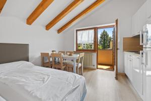 A kitchen or kitchenette at Residence Lagorai