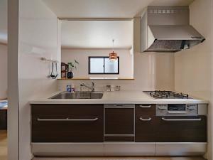 Dapur atau dapur kecil di 福助 豆腐OsakaTsuruhashi鹤桥5mins walk JR Loop/Namba/USJ