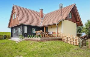 Byggingin sem sumarhúsið er í
