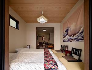 Katil atau katil-katil dalam bilik di 福助 豆腐OsakaTsuruhashi鹤桥5mins walk JR Loop/Namba/USJ