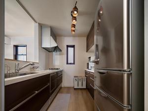 Dapur atau dapur kecil di 福助 豆腐OsakaTsuruhashi鹤桥5mins walk JR Loop/Namba/USJ