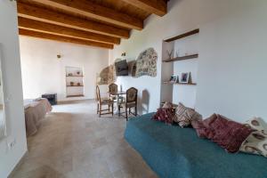 Posezení v ubytování Maison de Curtis