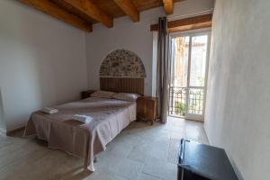 Postel nebo postele na pokoji v ubytování Maison de Curtis