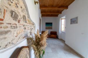 TV a/nebo společenská místnost v ubytování Maison de Curtis