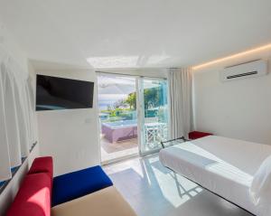 Postel nebo postele na pokoji v ubytování Aquamaris Design Suite & Spa