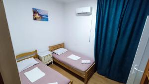 Postel nebo postele na pokoji v ubytování Ortachala Summer House