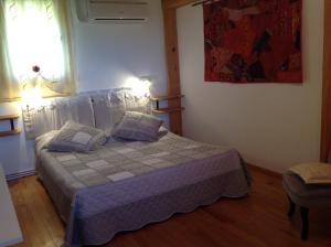 Postel nebo postele na pokoji v ubytování Petite Suite Douillette