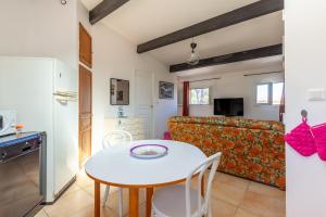 Et tv og/eller underholdning på Appartement - Portes Des Calanques