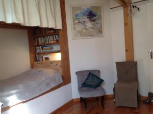 Postel nebo postele na pokoji v ubytování Petite Suite Douillette