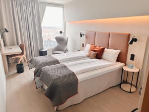 Postel nebo postele na pokoji v ubytování Quality Hotel Arlanda XPO