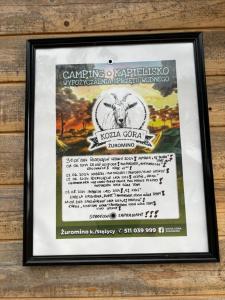 Certifikát, ocenenie alebo iný dokument vystavený v ubytovaní Ślusarnia-domek z sauną nad jeziorem, Kaszuby