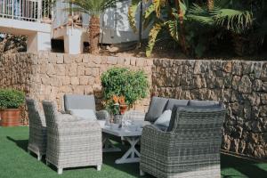 Posezení v ubytování INIBIZA VILLAS - Villa Romeo + 31 fotografií