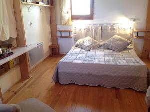 Postel nebo postele na pokoji v ubytování Petite Suite Douillette