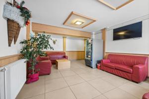 A seating area at Residence Lagorai