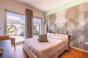 Ένα ή περισσότερα κρεβάτια σε δωμάτιο στο Villa Goccia - Rive del Salento +26 φωτογραφίες