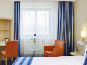 Voodi või voodid majutusasutuse IntercityHotel Nürnberg toas