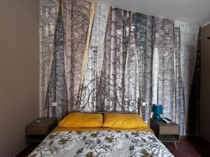 Postel nebo postele na pokoji v ubytování IL Poggio