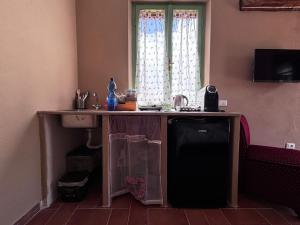 TV a/nebo společenská místnost v ubytování IL Poggio