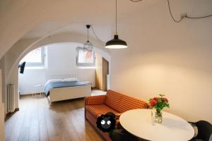 Postel nebo postele na pokoji v ubytování Flat Il Torrazzo XIII Secolo
