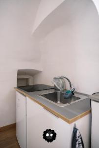 Kuchyň nebo kuchyňský kout v ubytování Flat Il Torrazzo XIII Secolo