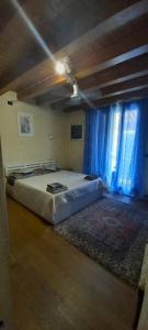 Postel nebo postele na pokoji v ubytování B&B Palmagrill