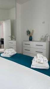 Posteľ alebo postele v izbe v ubytovaní CoRa Apartment
