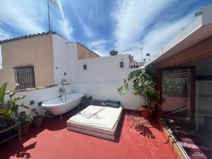 Fotografia z galérie ubytovania Cosy House, Sunny Terrace, Amazing Views & Outdoor Bathtub! v destinácii Granada
