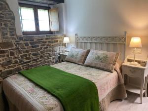 Postel nebo postele na pokoji v ubytování Apartamentos Rurales Ca Lulón