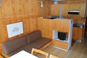 Cuisine ou kitchenette dans l'établissement Appartamento Marilleva 1400