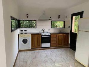 Kuchyň nebo kuchyňský kout v ubytování Casa Blandengues alojamiento temporal