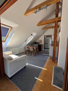 Posedenie v ubytovaní Apartament na poddaszu