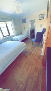 Postel nebo postele na pokoji v ubytování Ard Mhuiris B&B