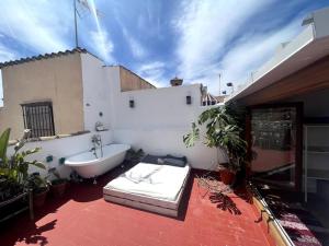 Fotografia z galérie ubytovania Cosy House, Sunny Terrace, Amazing Views & Outdoor Bathtub! v destinácii Granada