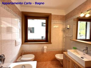 Koupelna v ubytování Appartamenti Florino di Silvestri Mariangela + 9 fotografií