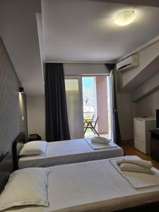 Voodi või voodid majutusasutuse Apartments Philip II toas