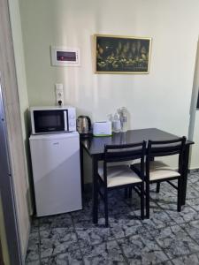 Kuchyň nebo kuchyňský kout v ubytování happyWish Syros