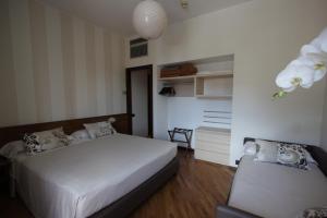 Letto o letti in una camera di Park Hotel Meublé