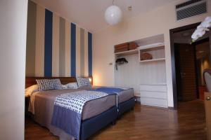 Letto o letti in una camera di Park Hotel Meublé