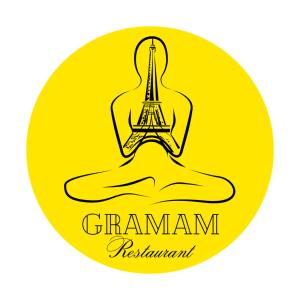 un'immagine di una campana con la torre Eiffel di Biriyani House a Bobigny