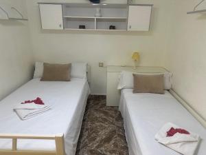Posteľ alebo postele v izbe v ubytovaní Homely Apartments Centro
