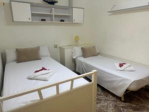Posteľ alebo postele v izbe v ubytovaní Homely Apartments Centro