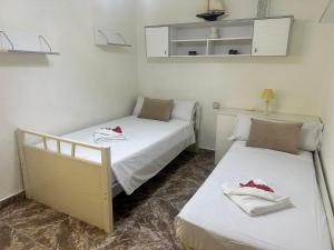 Posteľ alebo postele v izbe v ubytovaní Homely Apartments Centro