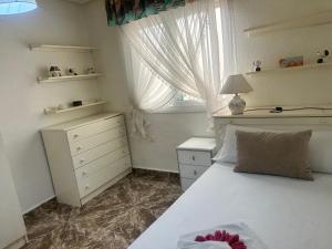 Posteľ alebo postele v izbe v ubytovaní Homely Apartments Centro