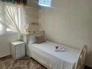 Posteľ alebo postele v izbe v ubytovaní Homely Apartments Centro