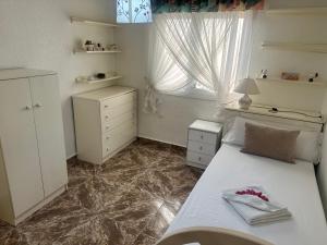 Posteľ alebo postele v izbe v ubytovaní Homely Apartments Centro
