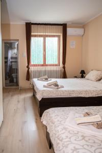 Guesthouse Kristina客房内的一张或多张床位