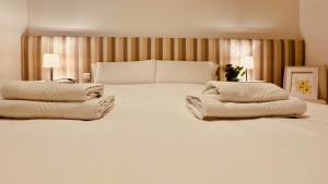 Ένα ή περισσότερα κρεβάτια σε δωμάτιο στο Click & Guest -Tablero Dreams in Maspalomas