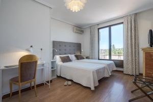 Postel nebo postele na pokoji v ubytování Hotel Eurowest